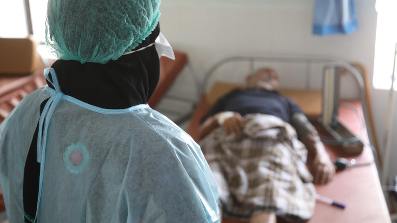 A doctor with patient in Yemen