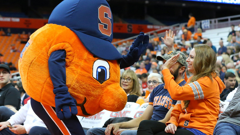 Syracuse orange mascot greets fans