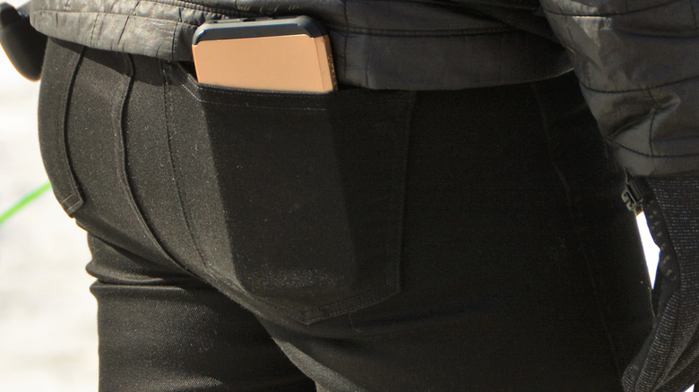 Phone in back pocket of tight pants