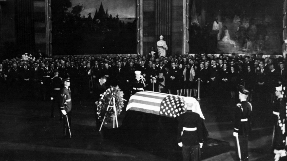 President Lyndon Johnson placing a wreath before the casket of President Kennedy in the Capitol Rotunda, November 24, 1963