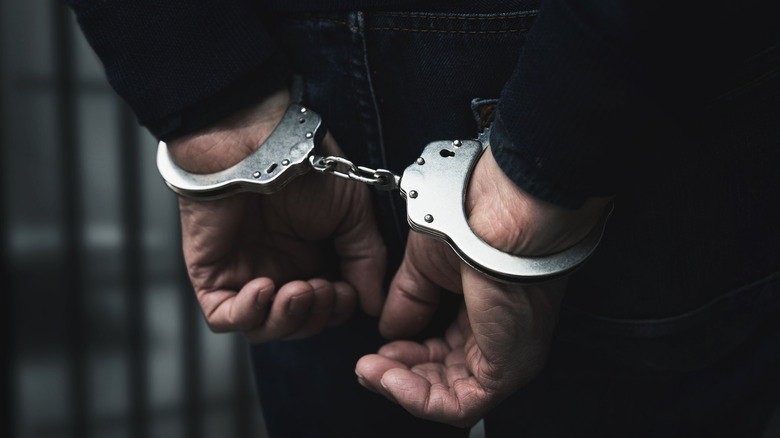 Photo of hands in handcuffs