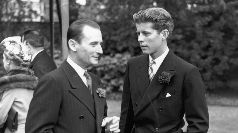 young JFK at a political party