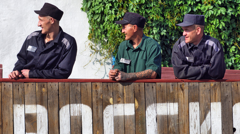 prisoners in Russian prison hanging out outside