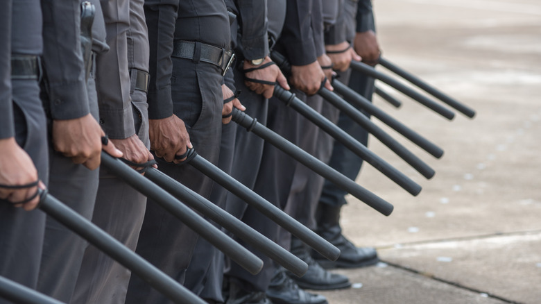 police Training in the use of batons to control crowds.