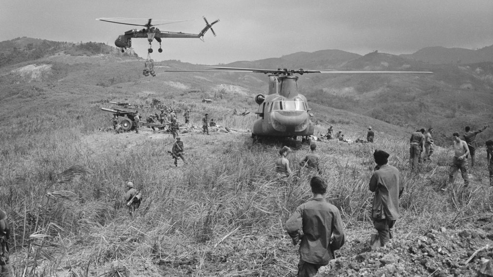 American troops take cover in trenches vietnam war