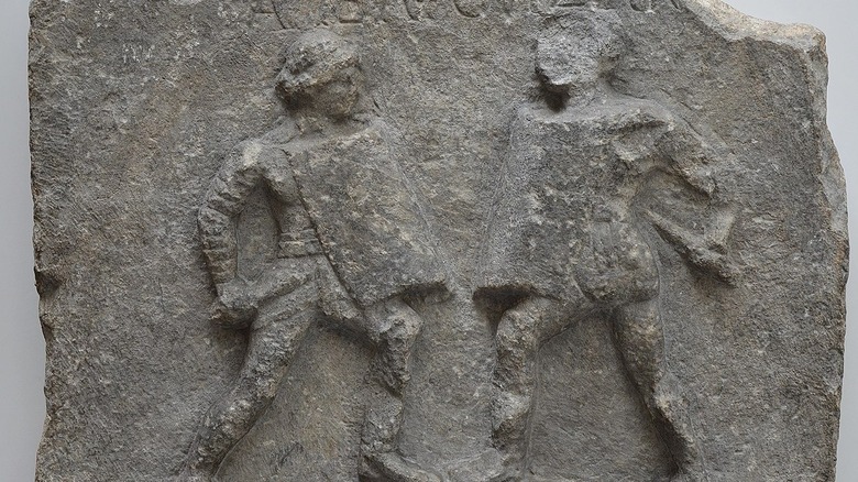 Grey marble relief female gladiators