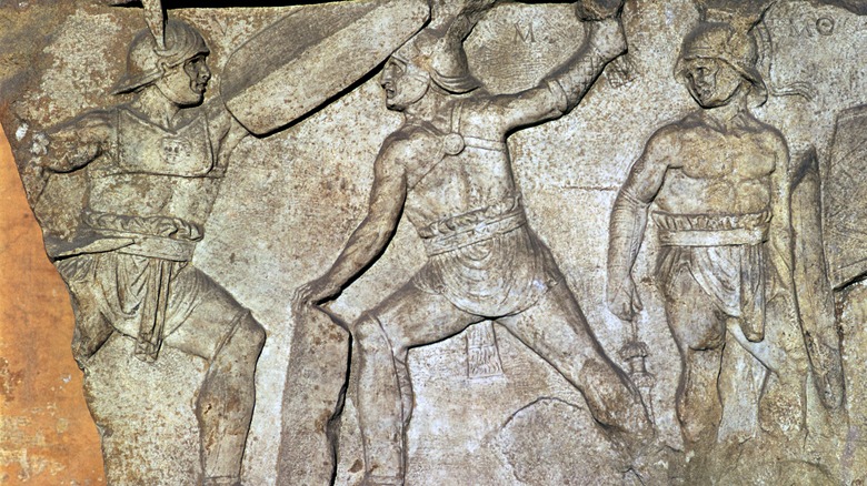 roman relief gladiators fighting