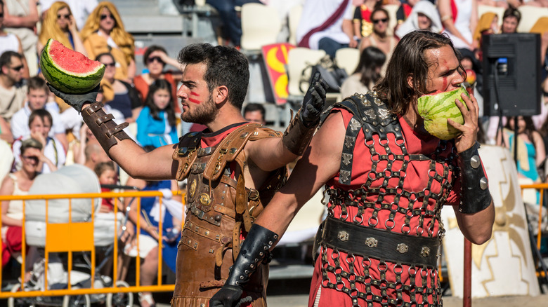 gladiator recreation eating watermelon