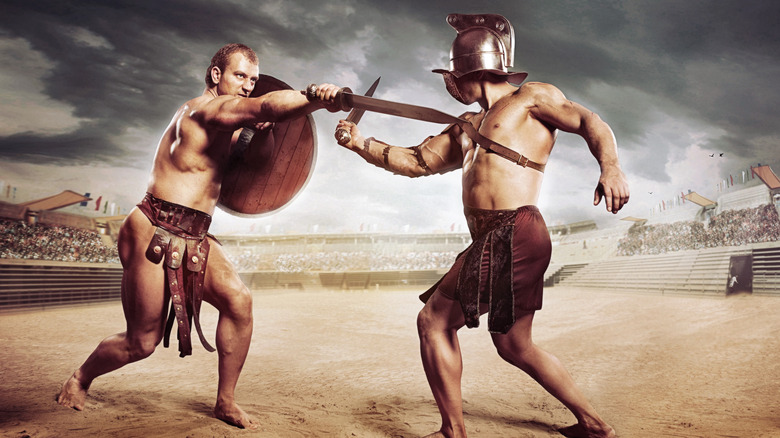 Gladiators fighting in arena