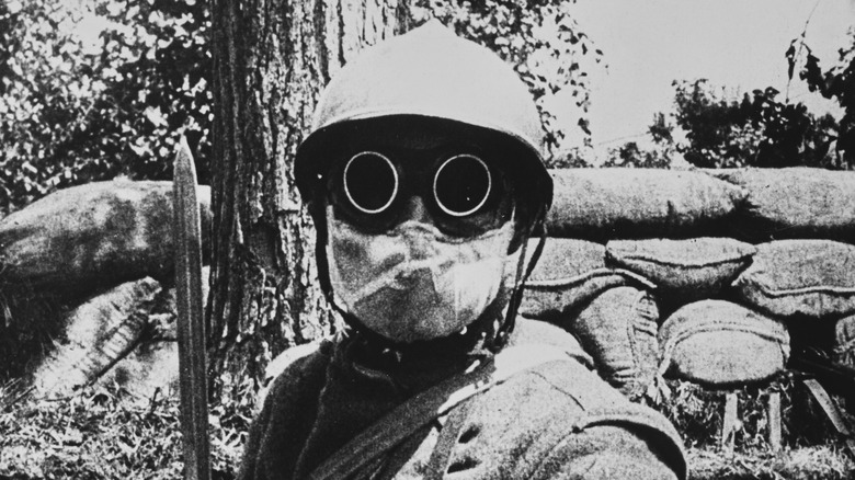 Soldier wearing gas mask