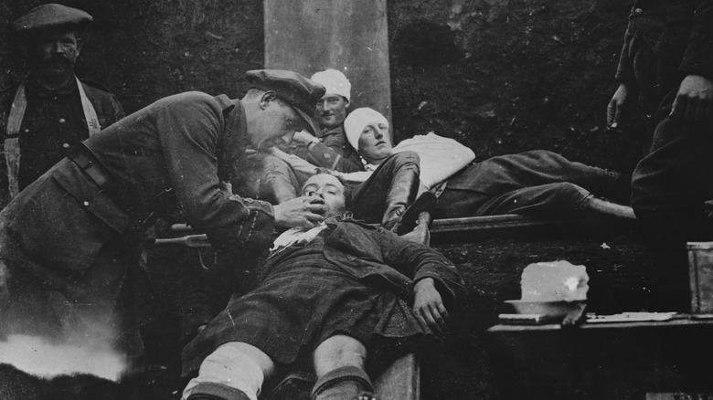 WWI doctor treating patient