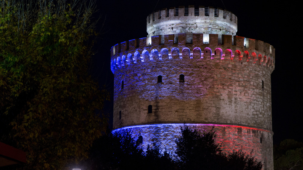 The White Tower lit at night in solidarity with France