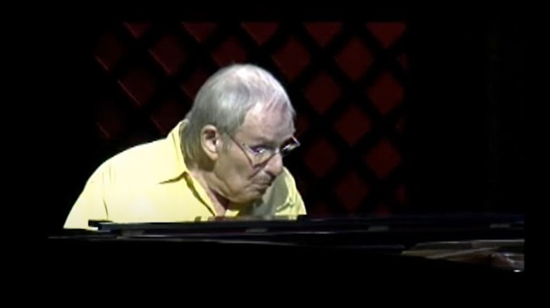 Older Hal Schaefer playing piano