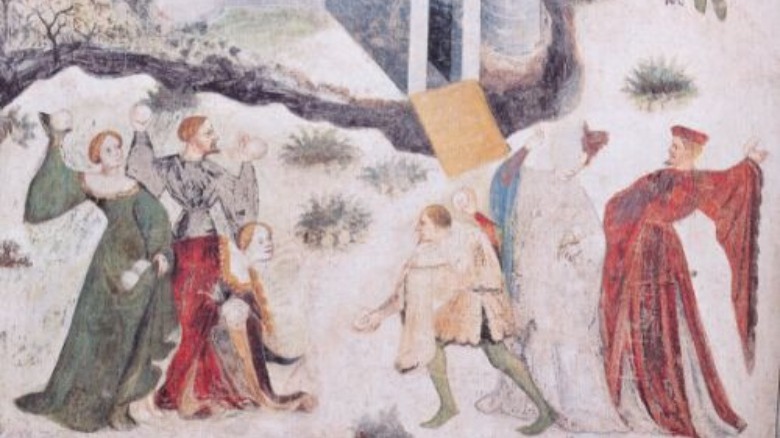 medieval people having a snowball fight painting