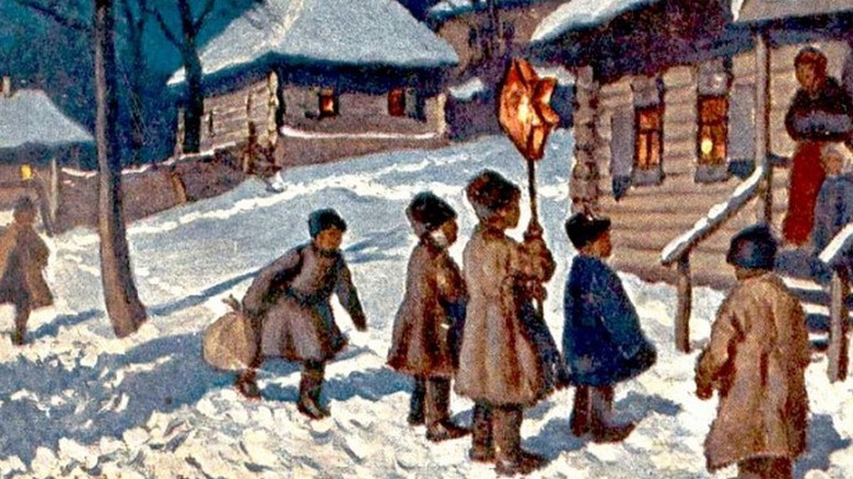 carolers with star painting