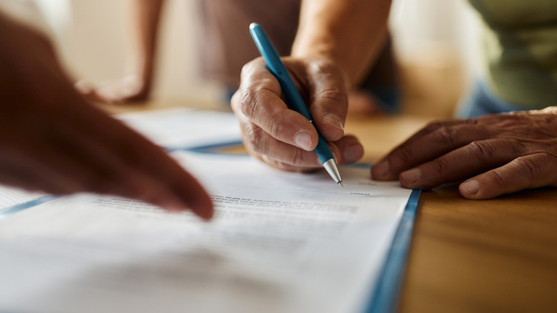 Person signing document