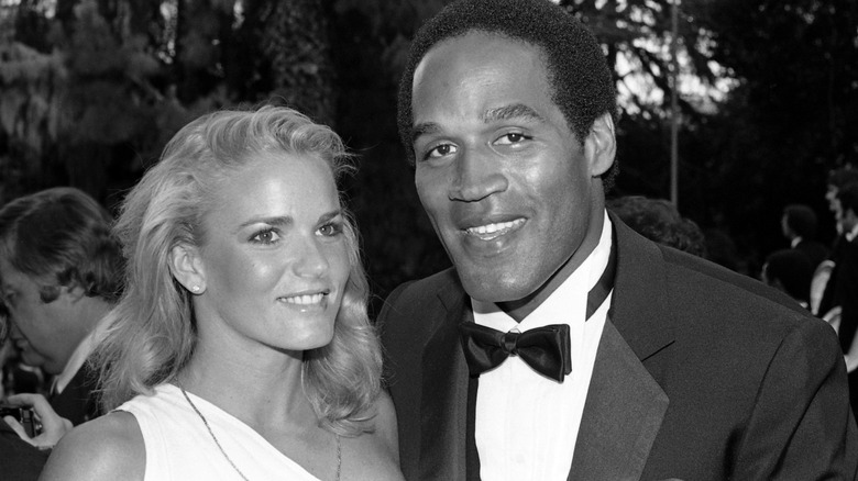 Nicole and OJ Simpson smiling