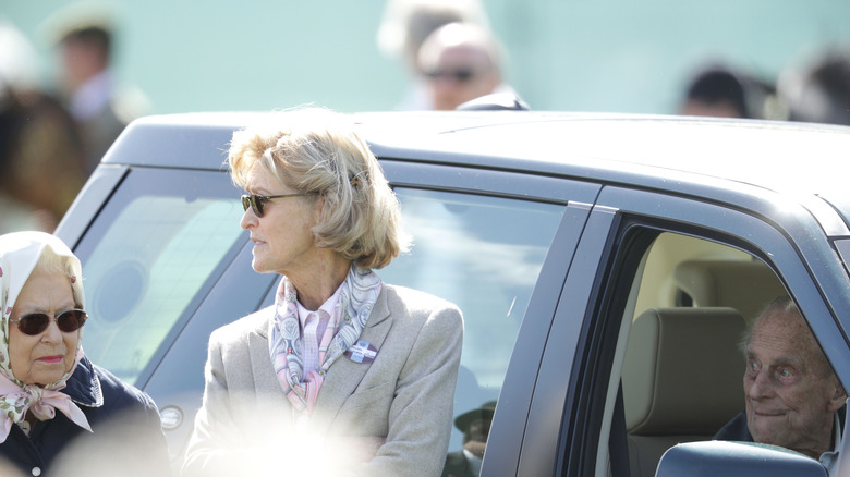 Penny Knatchbull, the Duke of Edinburgh, and the queen at a horse show