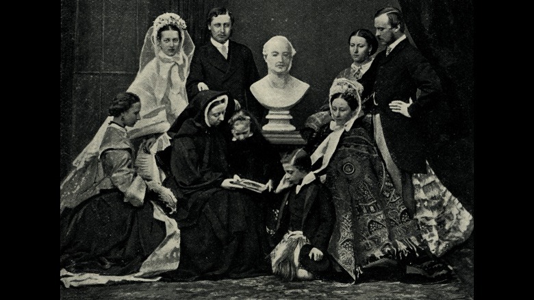 Queen Victoria seated with family