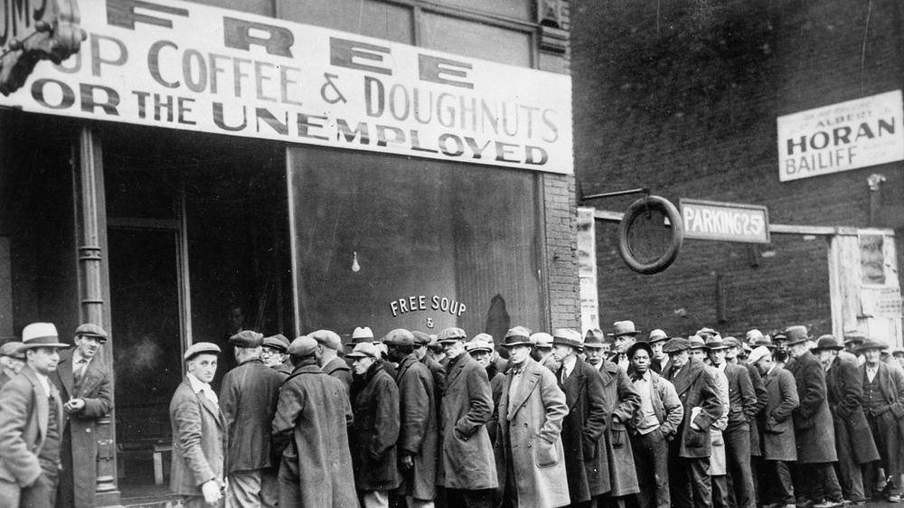 Unemployed men in line for free meals