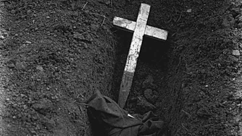 Bataan grave with buried cross