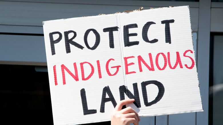 Protest sign protecting Indigenous land