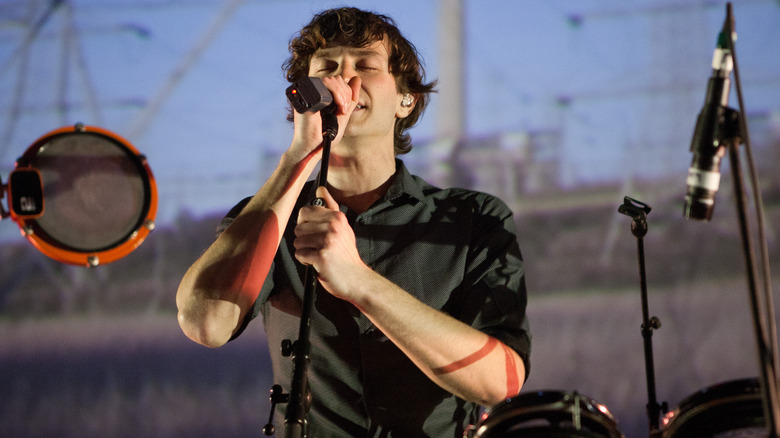 Gotye singing on stage