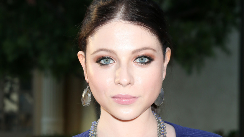 michelle trachtenberg hair back staring into camera