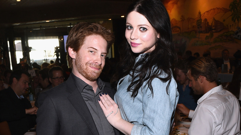 michelle trachtenberg facing seth green smiling