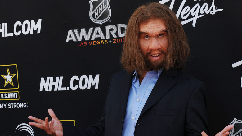 McManus Woodend posing as Geico Caveman