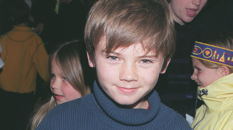 Jake Lloyd attending an event for 'Rugrats: A Live Adventure' in 1999.