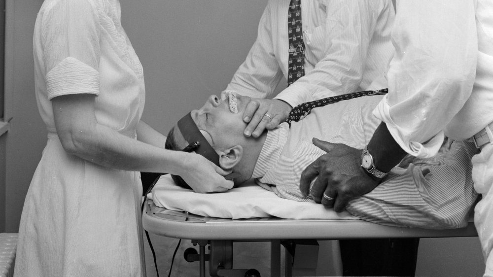 A patient at Hillside mental hospital undergoes electroconvulsive therapy (ECT), whereby an electric current is passed through the head 1955