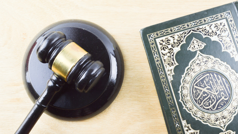 a gavel and quran