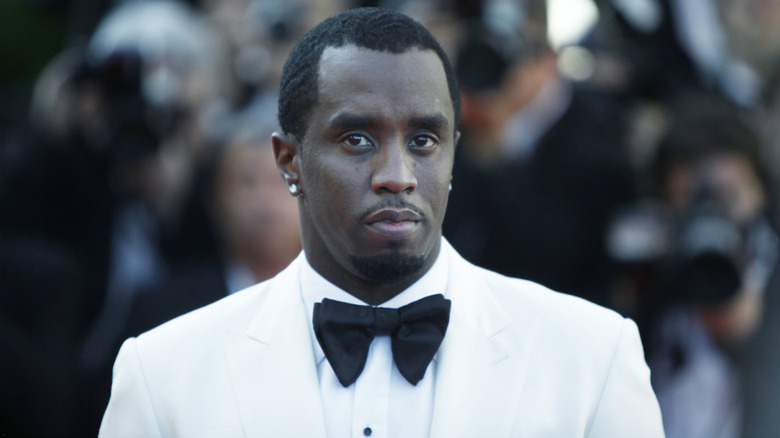 Diddy staring toward camera