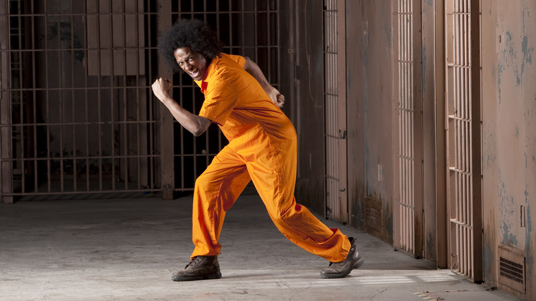 prisoner in a running stance