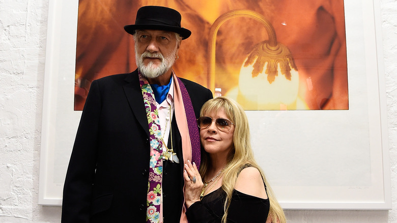 Mick Fleetwood and Stevie Nicks embracing in gallery