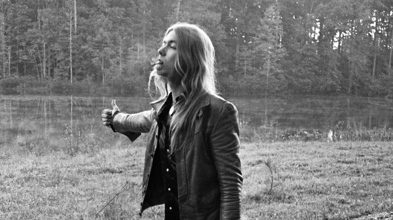 Gregg Allman pretending to hitchhike in 1970s