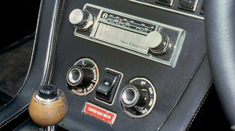 old car stereo with 8 track player