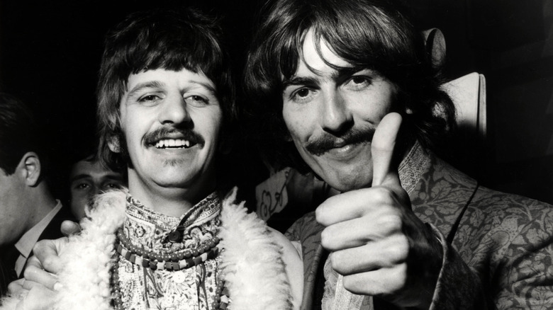 Ringo Starr George Harrison thumbs' up