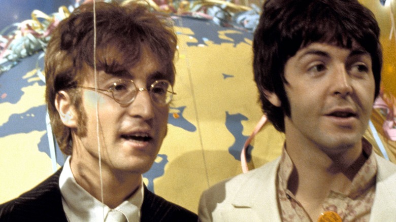 John Lennon and Paul McCartney at a press event