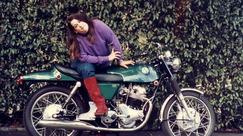 Cass Elliot on a mototcycle