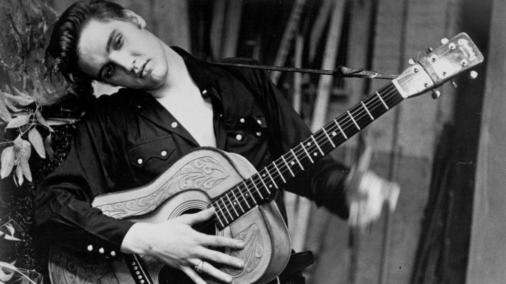 Elvis with guitar, 1956