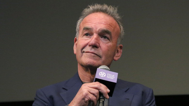 nick broomfield holding microphone