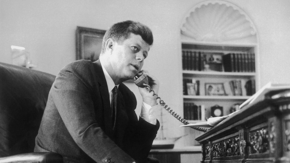 President John F. Kennedy making a phone call