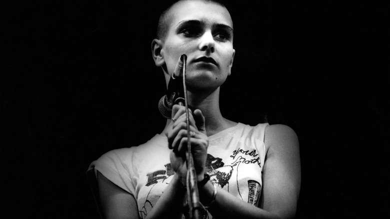 black and white portrait Sinead O'Connor on-stage