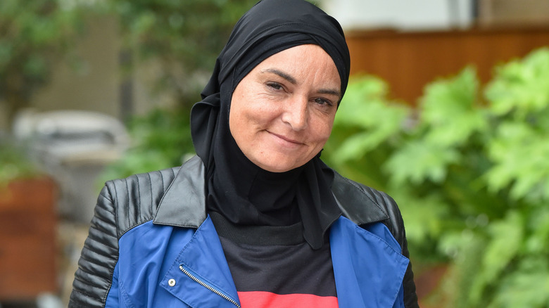 Sinead O'Connor outside and smiling