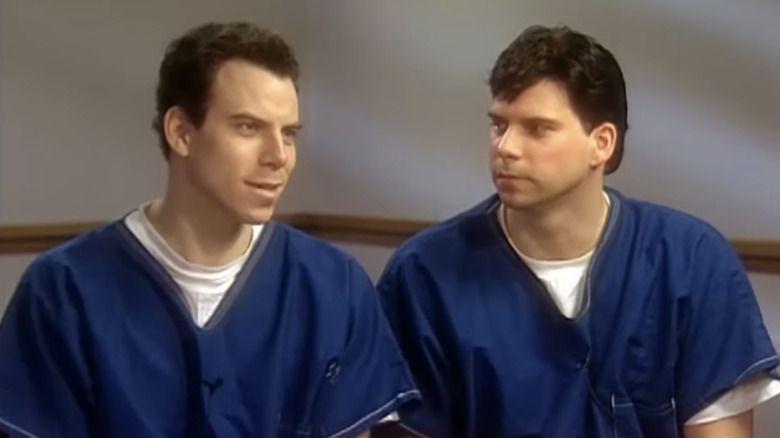 Menendez brothers sitting in blue jumpsuits