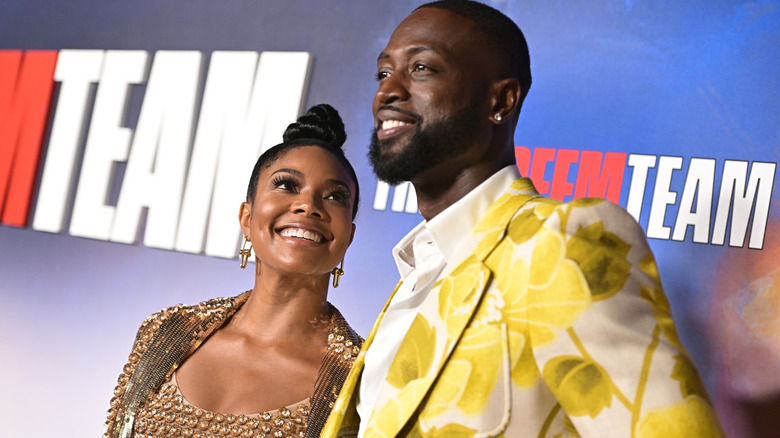 Dwayne Wade smiling with Gabrielle Union