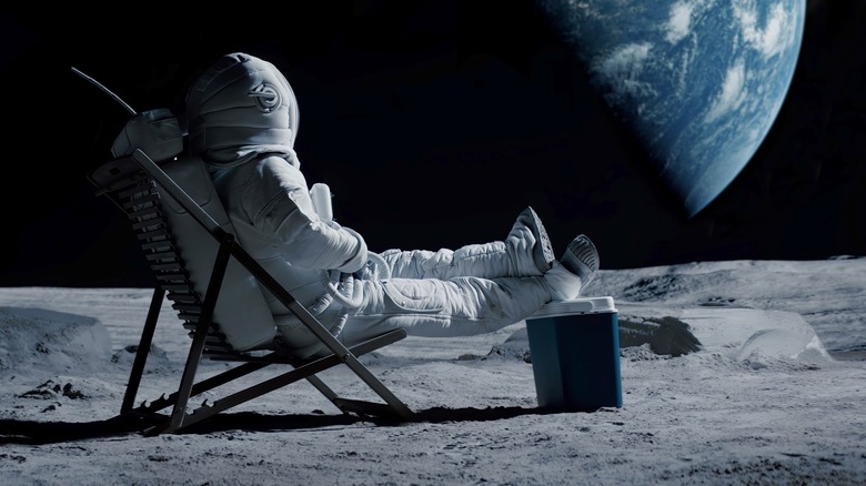 astronaut on a beach chair