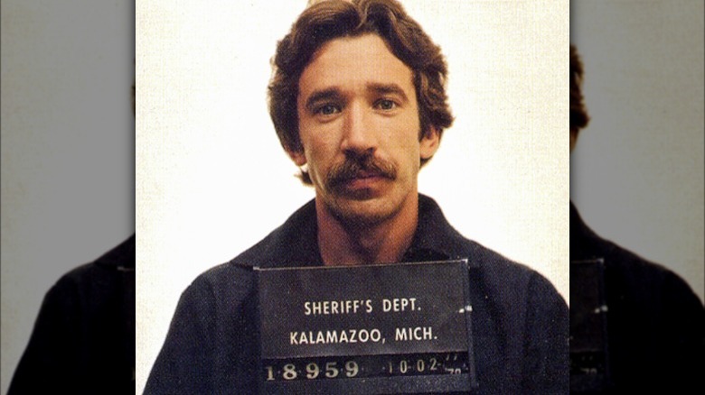 Tim Allen posing for mugshot